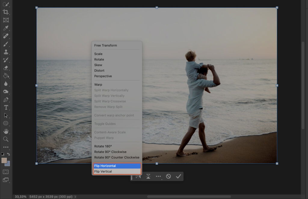 A photo editing process, with an image of a man and woman on a beach in the background. 