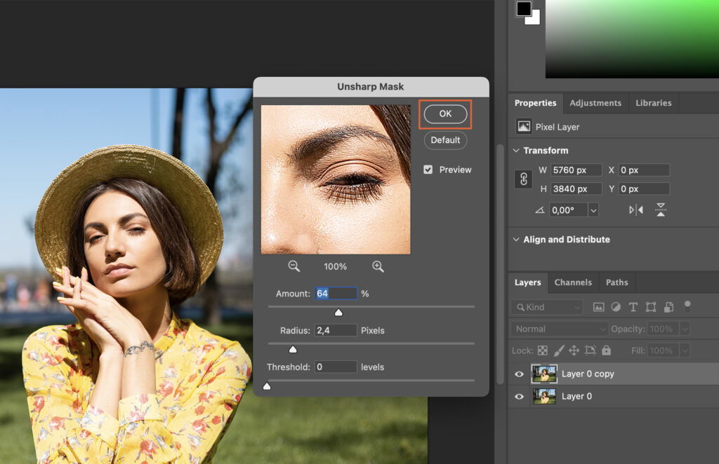 A woman with dark hair wearing makeup and a flower dress in a photo editing software.