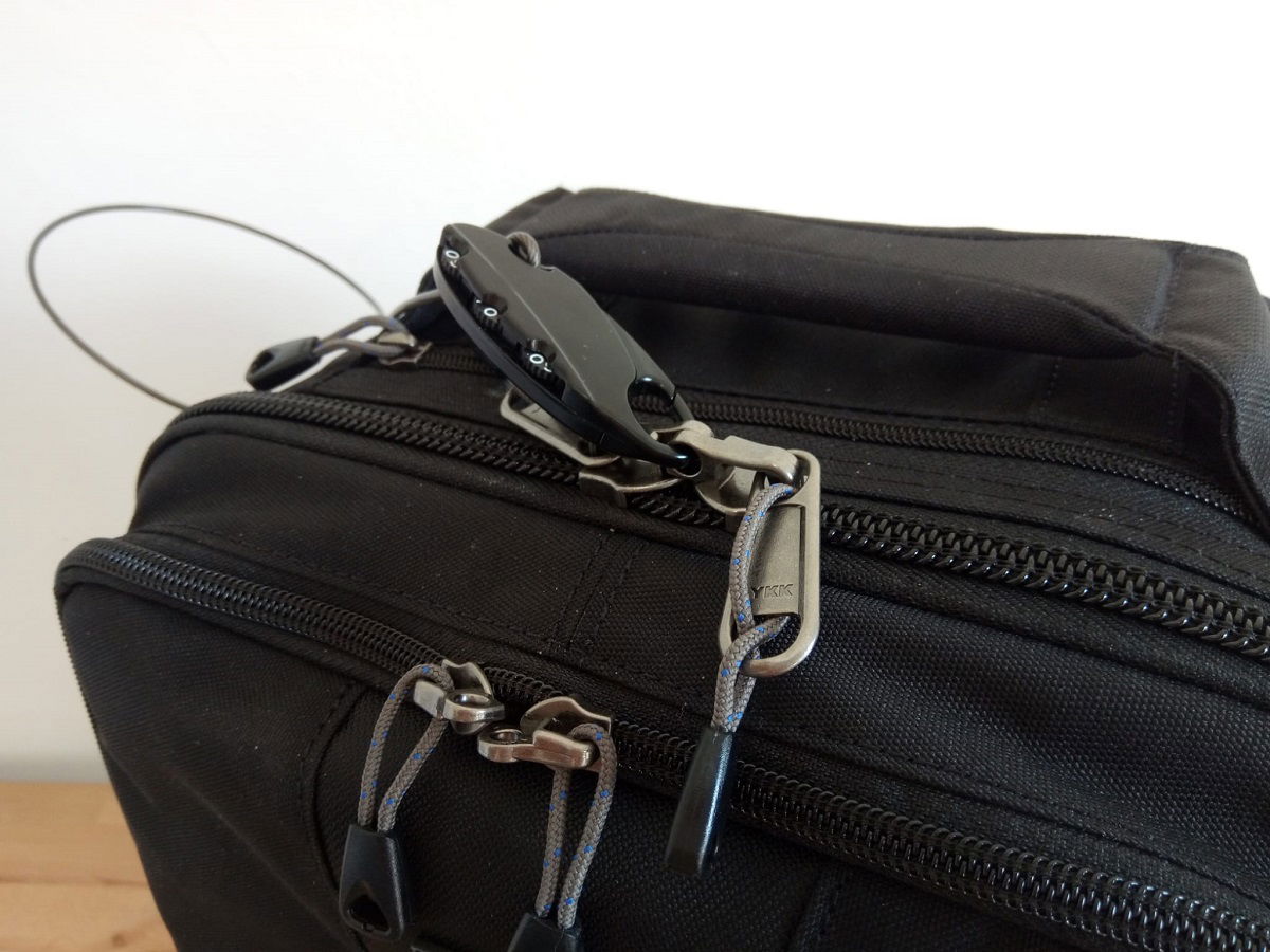 Lock attached to zippers