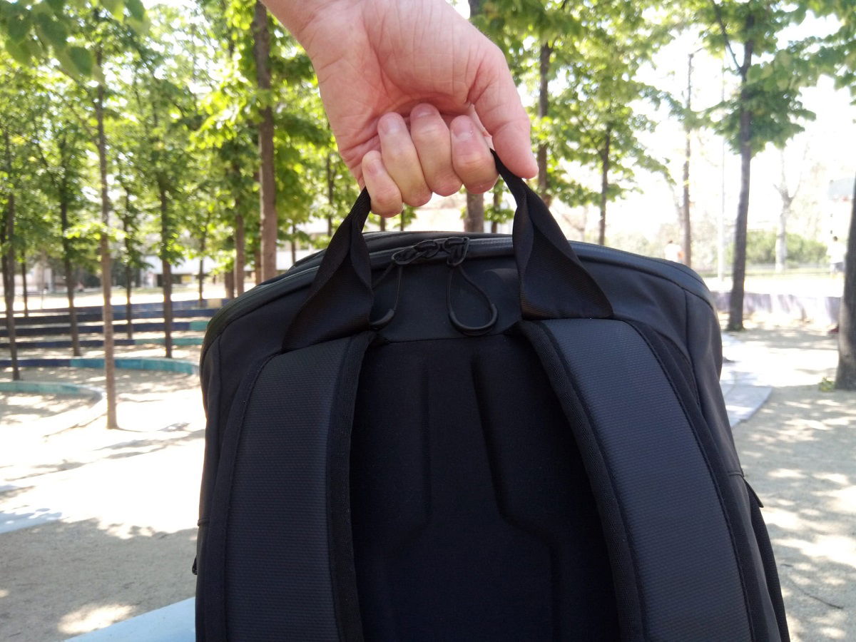 Bag being held by the top handle