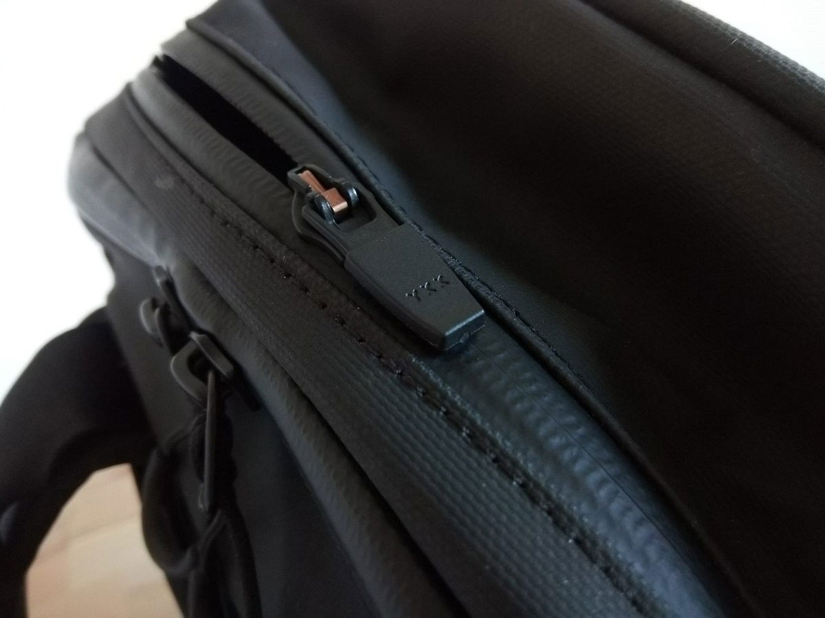 Close up of YKK zipper with rubber waterproofing