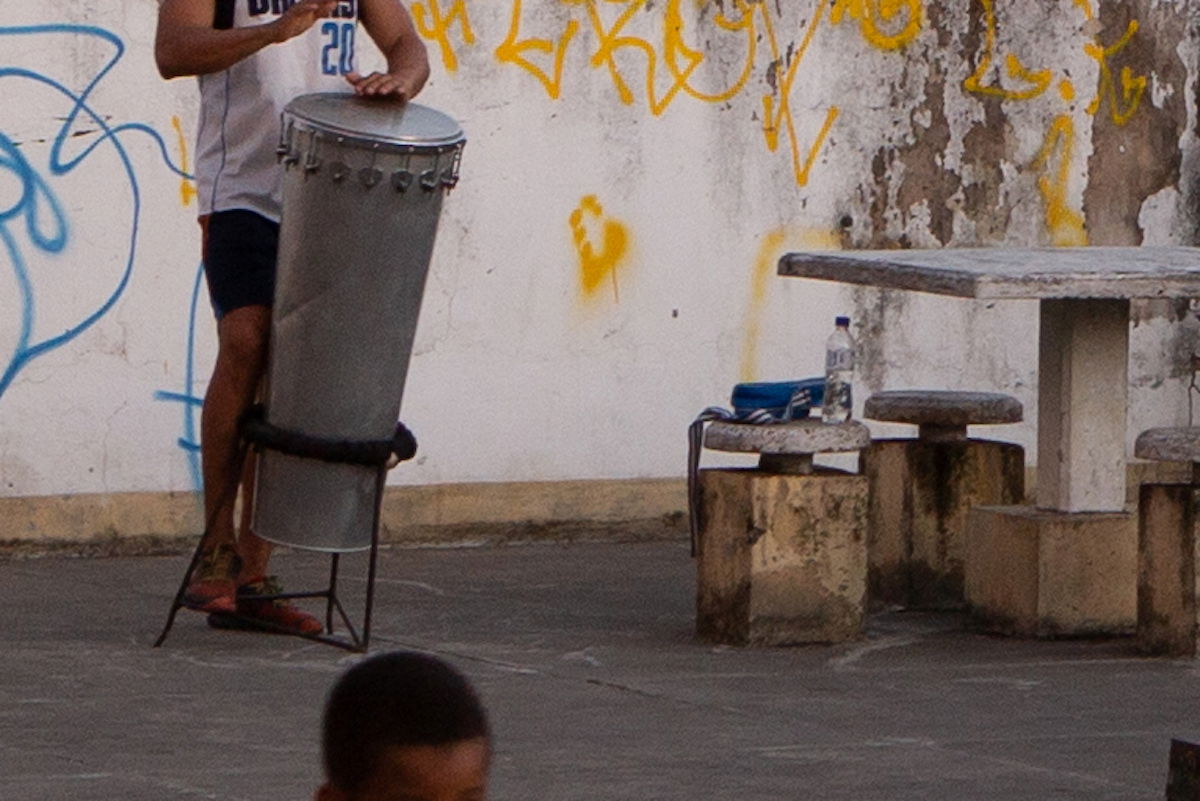 Lightroom crop of a person playing a steel drum