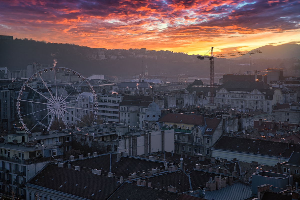 Luminar Neo sky edit of cityscape with Ferris wheel