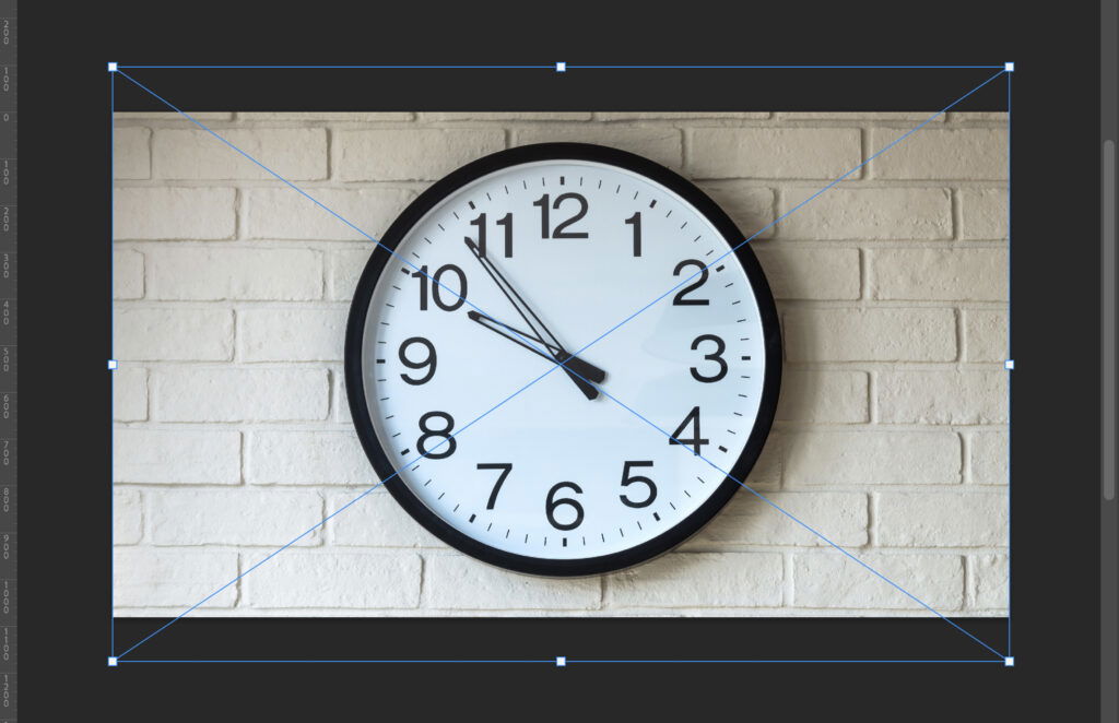 A clock with a clear, bold black number against a white background. 