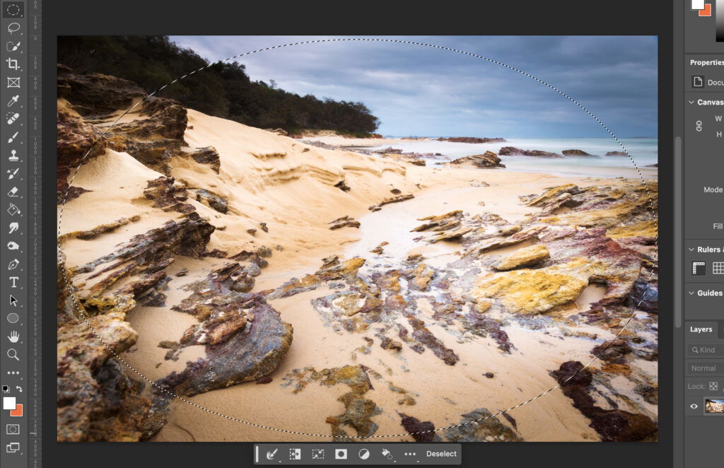 A coastal scene displayed in the center of the screen.