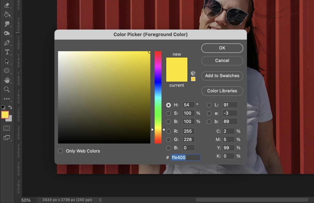 A color picker dialog box with the selected color being yellow, alongside the RGB values and sliders. 