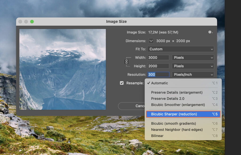 A blurred wallpaper featuring mountains, and an open photo editing software interface with the properties panel visible. 