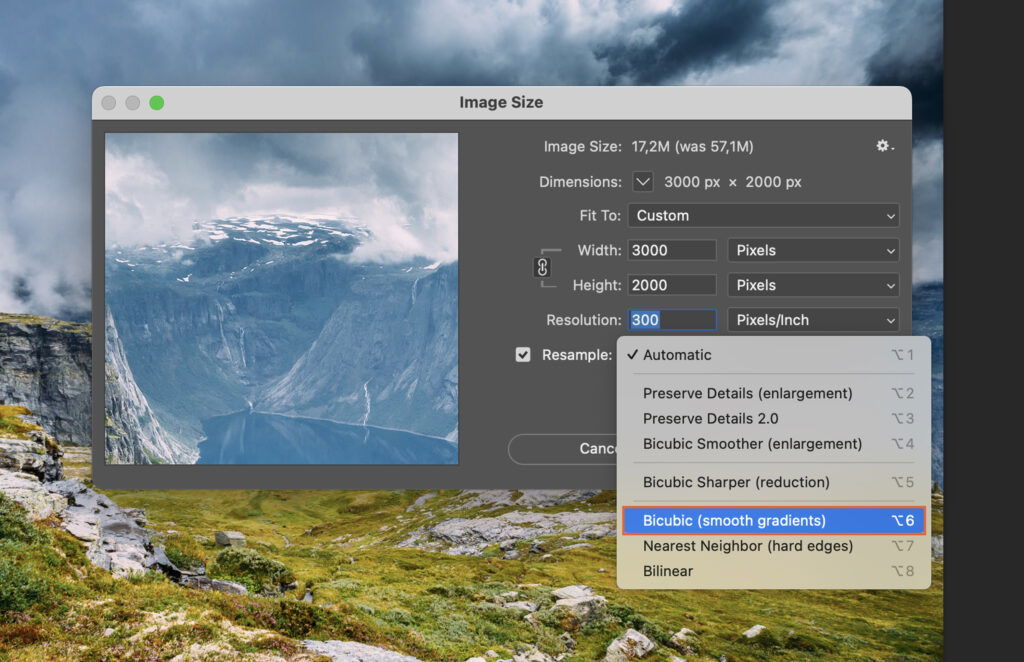 An editing application open, showing a photo of a mountain landscape and the various sliders and settings of the software. 