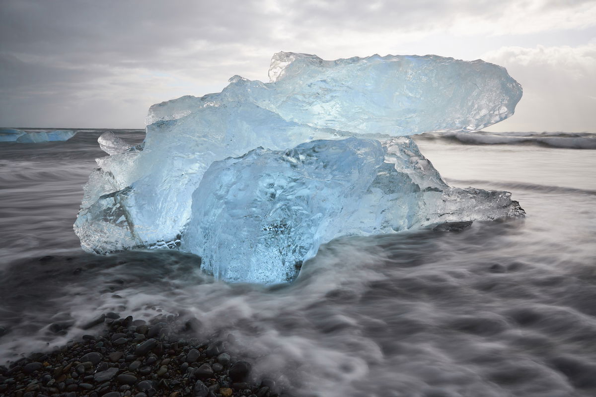 Long-exposure image of an ice floe washed ashore edited with Capture One