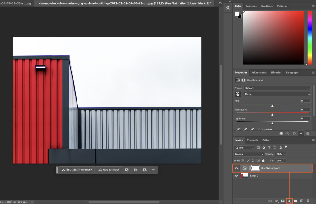 A photo editing program, displaying a photo of a red shed with white walls, sitting next to another building, and the edited version appears at the bottom of the program. 