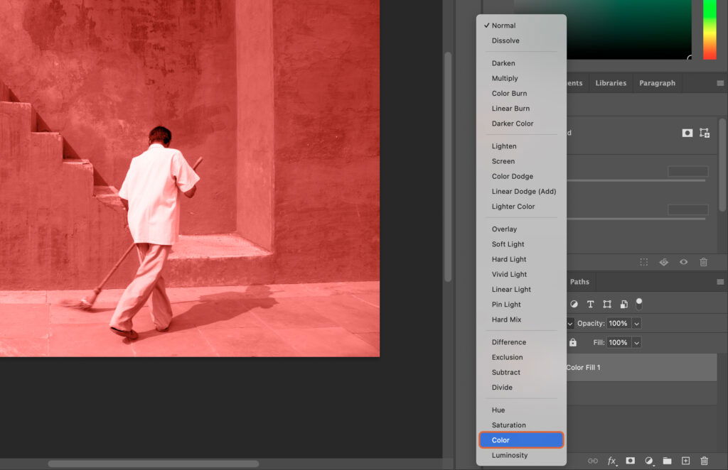 Adobe Photoshop, with a partially finished picture of a person on steps. 