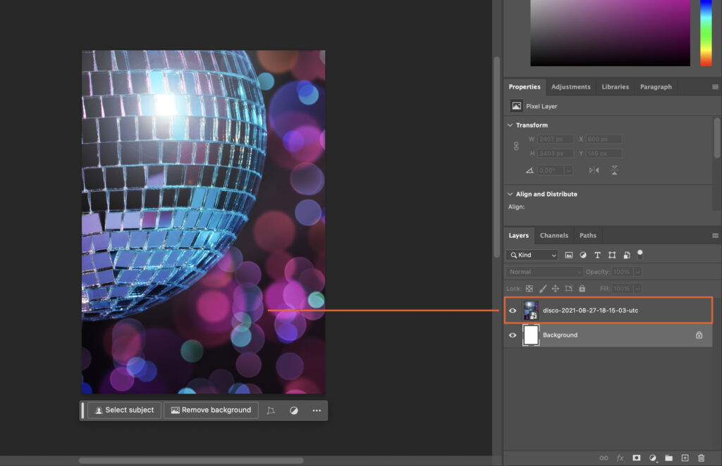 A software interface showing the image of disco lights on a background, with digital effects like bokeh and lens flares applied to it. 