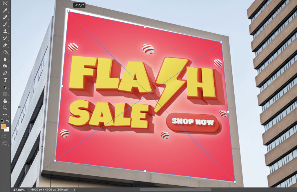 A tall billboard advertising Flash Sale on the street with the background building visible. 