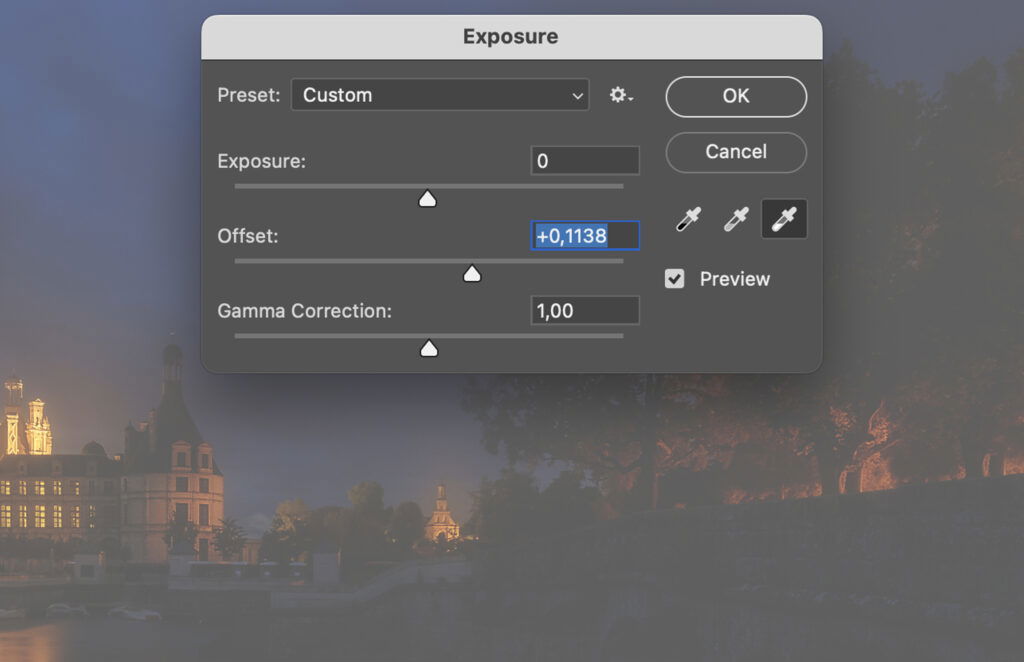 The exposure settings in the editing software Lightroom, with a beige and blue cityscape as the background. 