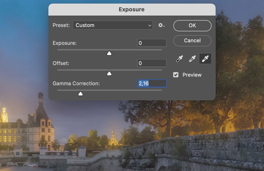 The Exposure tool in Adobe Photoshop, showing its settings being adjusted for a nighttime photo.