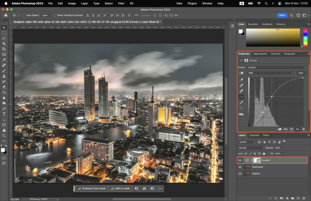 A photo editing program with a nighttime cityscape image in progress.