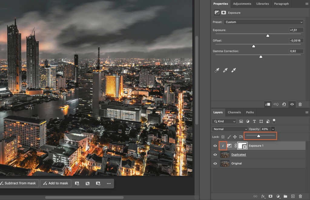 A cityscape at night with various editing tools, such as adjustments to color and brightness, being used. 