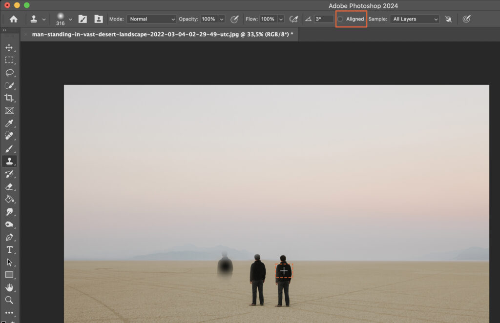 Adobe Photoshop interface displaying a desert scene with two figures.