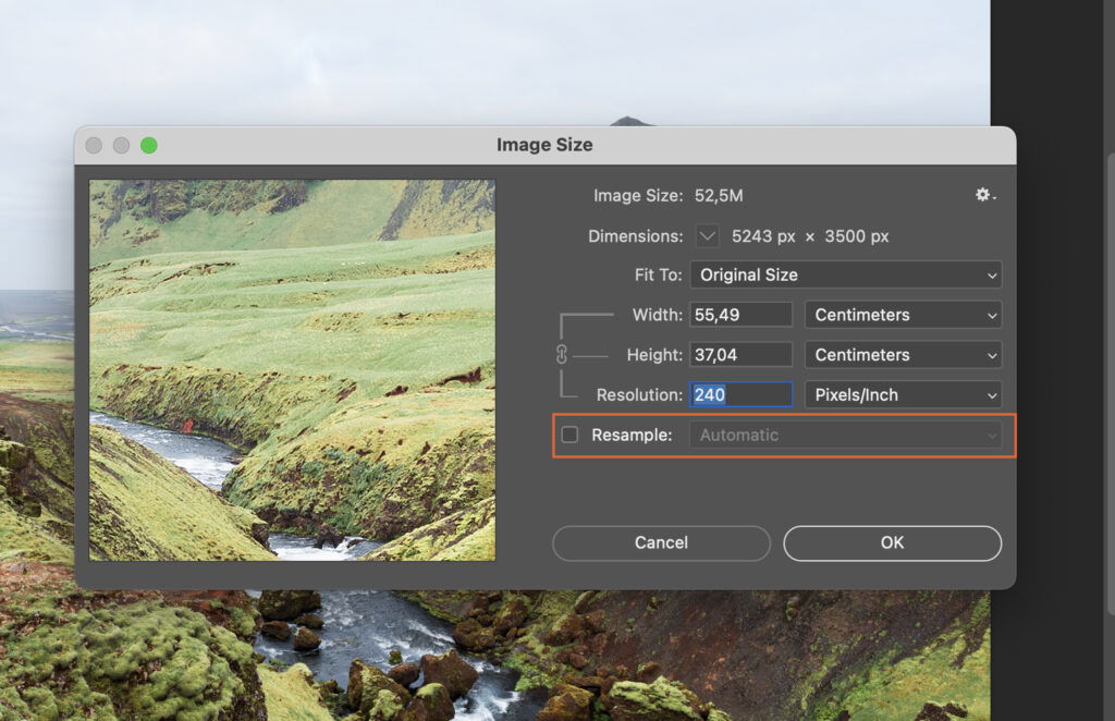 A photo editing software, where a landscape photo is being edited in a zoomed-in view, with various panels and settings visible on the screen. 