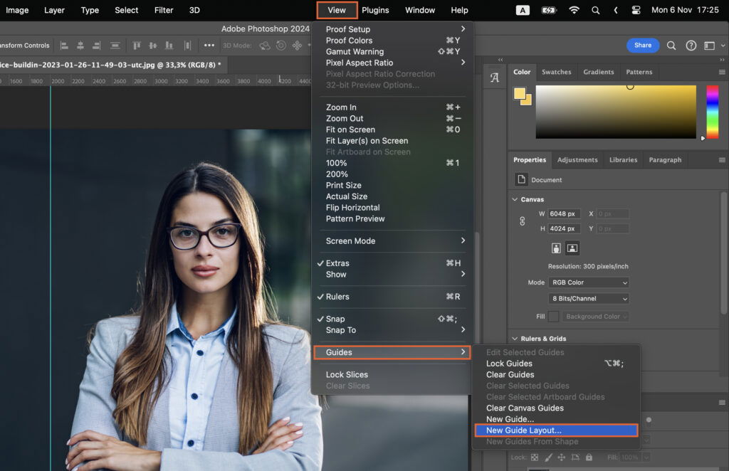 A photo editing software open, featuring a woman in a business suit and the interface of the software. 