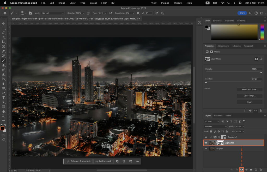 A photo editing software, showcasing a cityscape at night. 