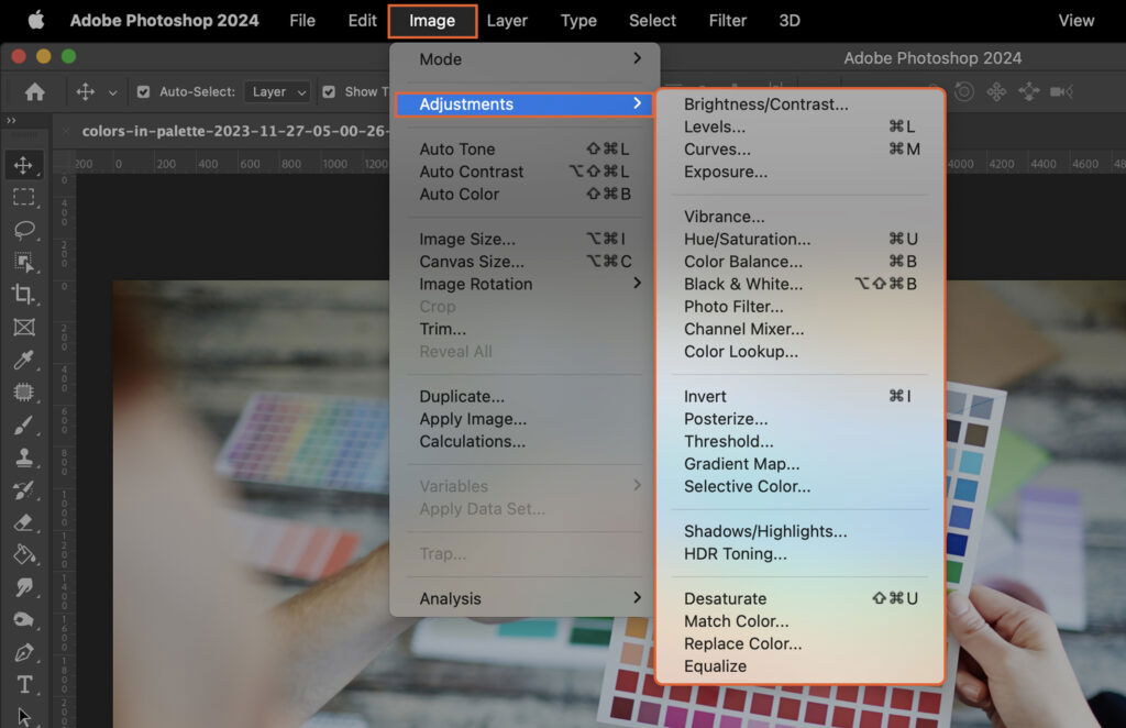 Adobe Photoshop application open, displaying a palette of colors in its interface and a screenshot of a color picker tool. 