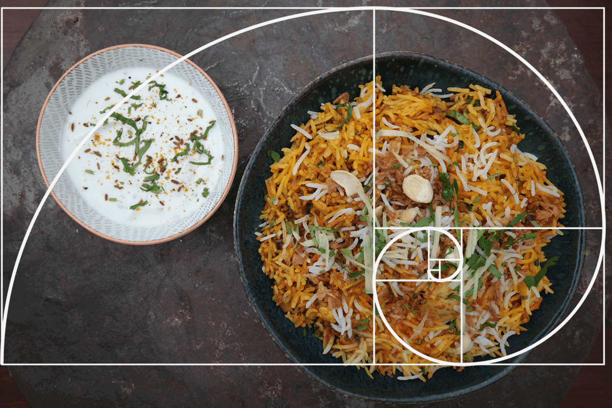 A picture of two food dishes, with the Fibonacci spiral superimposed over the top