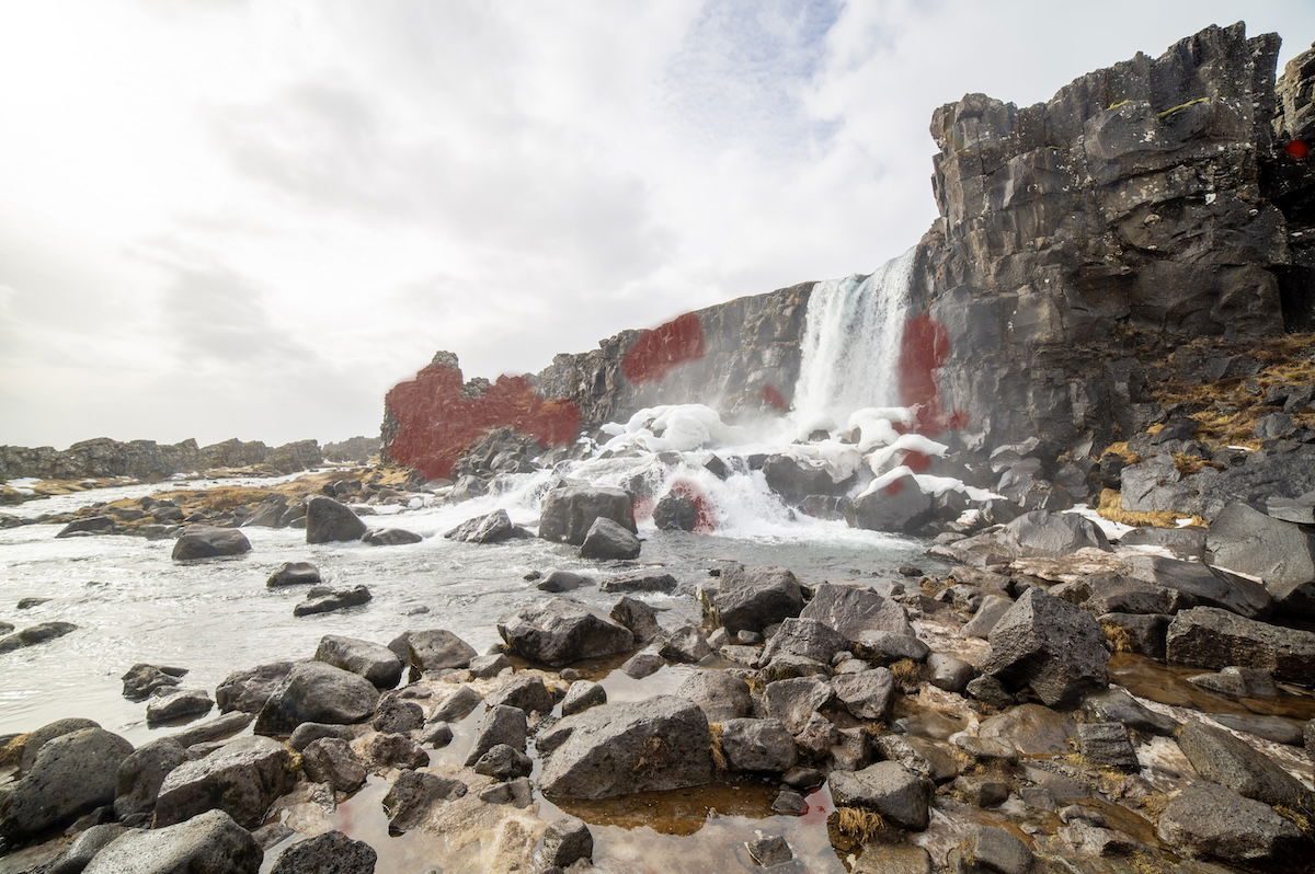 photograph of a waterfall with a deghost overlay showing low deghosting