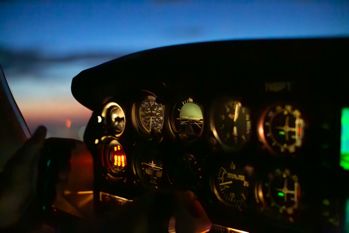 Photograph of a cockpit at night 