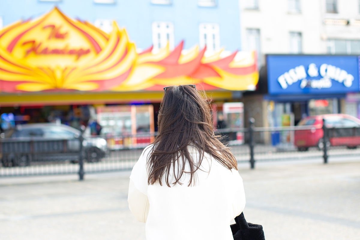 overexposed image of a woman shot from behind edited in lightroom