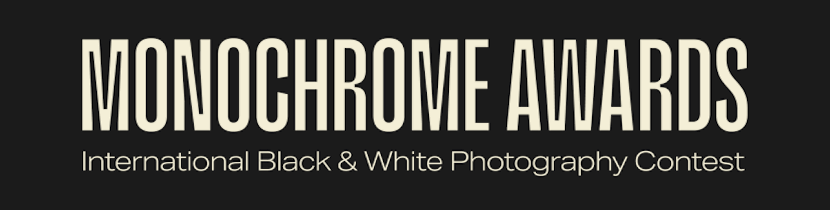 An invitation card for the Monochrome Awards, which showcases photography and visual arts. 