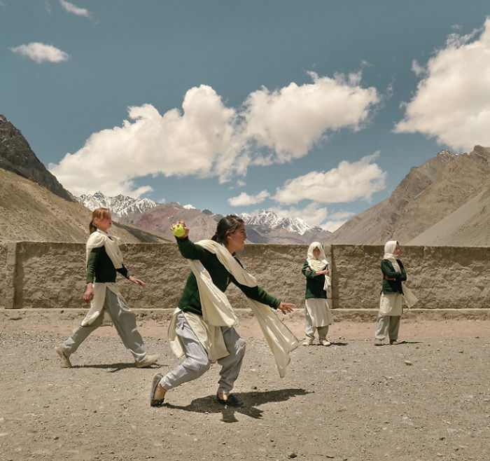 Muslim schoolgirls playing cricket