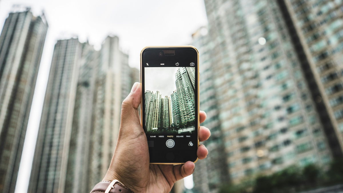 phone photographer taking picture of buildings