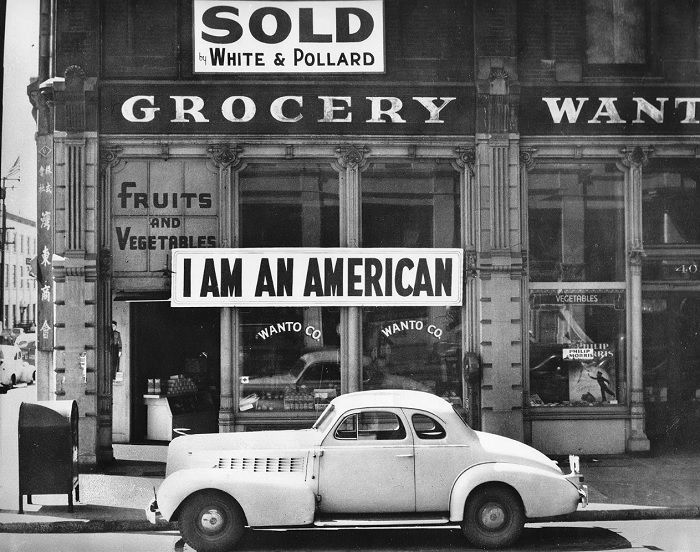 Car in front of old front window