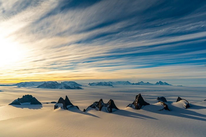 Sweeping snowy mountainous landscape