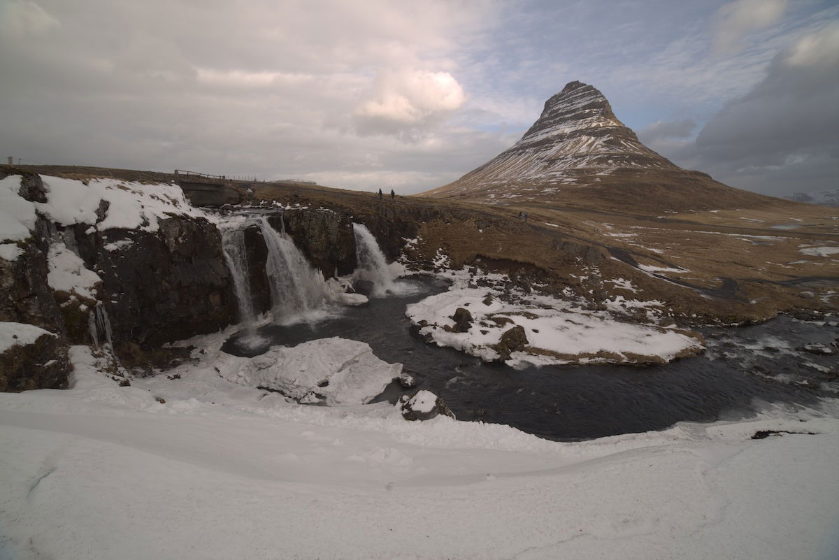 RAW image of snowy mountain with waterfall from darktable