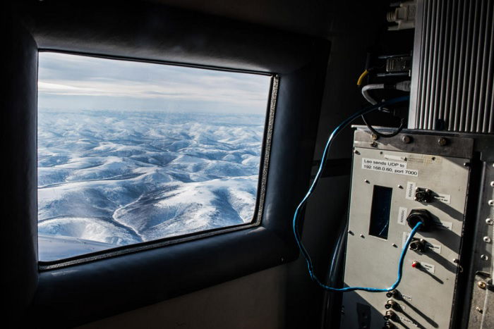 Frozen wasteland seen from plane window