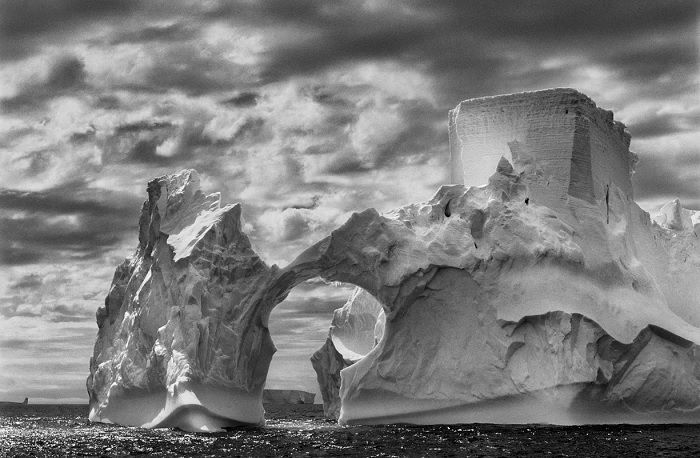 Massive ice formation floating in arctic sea