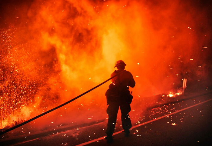 Fireman tackling a blaze