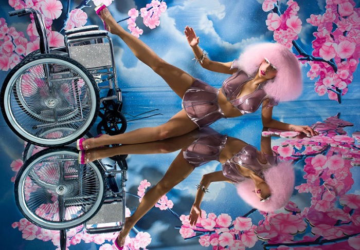 David LaChapelle portrait of Lady Gaga falling out of wheelchair in pink wig